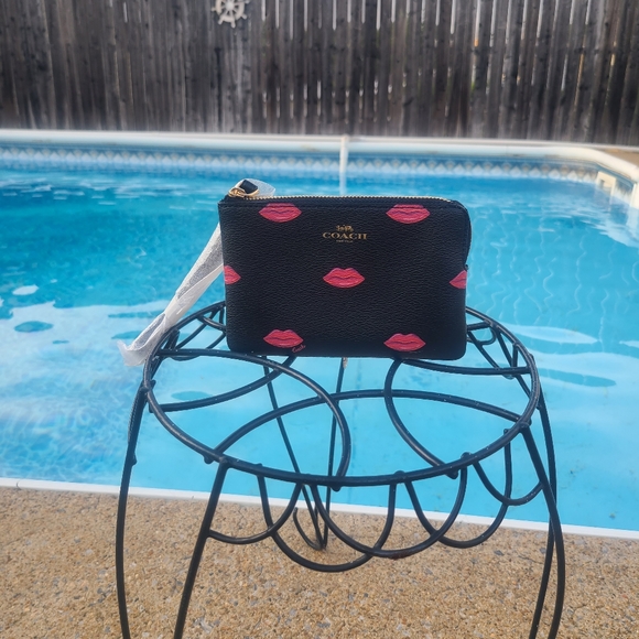 Coach Handbags - NWT Coach Wristlet black with pink lips